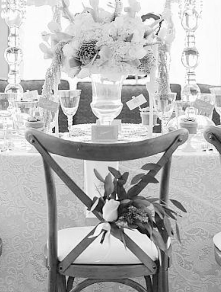 An event table setting with Chair-man Mills–supplied rental items.